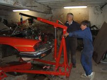 In the ajoining barn, me and nephew removing engine
