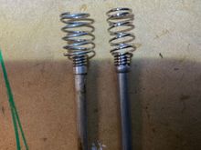 The rod from the coils in my car on the left and the rod from the new boots on the right. Old one has a slightly thicker diameter spring coil with a slightly larger radius on the spring. Rods seemed very similar. I think my old one is just so slightly heavier.