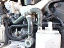 View of supercharger coolant filler plug