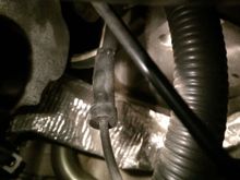 View from sticking iPhone down between the plastic fresh air intake thingy (technical term) and the firewall.