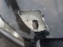 I needed to open up the hole in the outer skin to get my tool in to cut the latch free