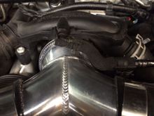 I cut off about 1/2" of excess silicone on the 3.75" to 3.5" reducer on the 3.5" end to clean up the fitting.