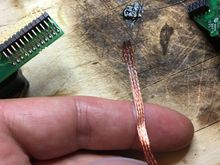 This is what you use to wick old solder. I didn't take more pictures as I was finally alone and not sure how much time I have. Plus taking pics alone when doing stuff takes 3 times as long.