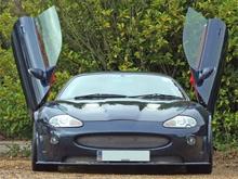 Lambo doors on an XK Coupe.