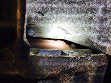 There's one of the bolts on the right, I couldn't get to them to check their torque.  It seems you must hand crank the engine.