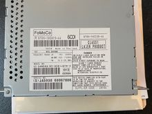 2008 XKR base system audio module with 6 cd changer part number label