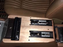 Slides for center console pop up stereo display.