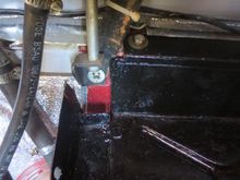 Slot in back to accomodate tank strap