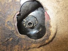 Access hole made large enough to get at the drain cock in the sump tank.