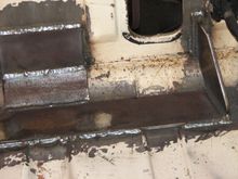 trunk/boot floor reinforcement for red urethane trans mount below.  A smaller spare fits.  it matches the height of the 245 45 17's