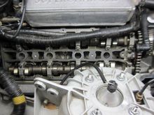 I cleaned the mating cylinder head surface with brake fluid and a cloth rag