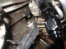 Extension on the adaptor, hose running across the rack