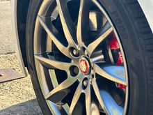 Wheels sprayed in a shadow chrome custom paint and lacquered, callipers sprayed in red with white lettering then lacquered.