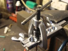Forming the Male Flare with the Clamp, Die and Press.