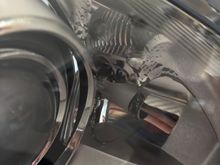 Showing melted portion of headlight. 