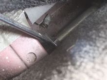 Just undo the Lock Nuts where you see the Spanner, then Screw the Nut against the Tube to tighten it up.