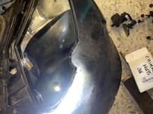 Torch illuminating drain holes. 