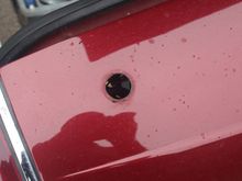 Clean around the edge of the hole before you fit the New Grommet (This was the before shot)