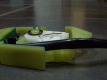 Spring wire pulled forward and on top of tab for tighter ratchet.  Use your own discretion if you think it is a wise modification.