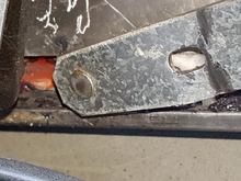 This is the front arm of the regulator. It connects to the white nylon fixture which rides (slides) in the channel at window bottom.