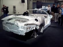 2013 04 21 09.14.00

Aluminum bonded body in white uses skin as support-different from uni body. Not just a shortened XK plateform.