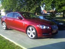 Snapping pics at friends house with our little Miata in the background.  LOL  (Jag before any chrome and leaper.)