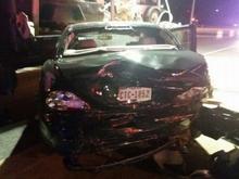 I was rear ended while sitting still at a red light. The driver was going about 80 mph. It pushed me 50 feet over median and I crashed into a construction truck.