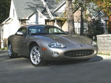 2002 Jag with new egg crate grill over mesh. Top is up because it is cold out and didn't wan ther to geet cold.