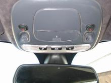 Exhaust baffle and front parking sensor switches