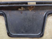 Rear tray as removed, top trough is where air goes from cabin to exit around boot lid. Notice thicker foam on top of divider as well as pile of gray putty on each end to seal the gaps when installed.