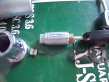 My black in the lock cylinder with the roll pin dropped down into the cylinder slot. Discs 5 and 6 don't consistently rotate enough to allow the pin to drop down out of the groove in the lock barrel.
