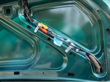 Video camera wires fastened to existing wires