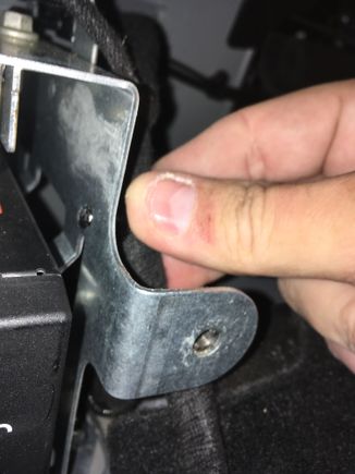 7. You will need to remove this cable hanger from the outside of the rack to be able to access the mounting screws.  This is more easily done through the trunk, IMHO.