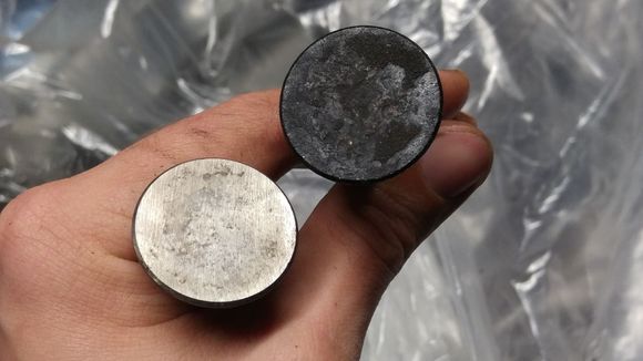 Exhaust Valves after and before.  The carbon was so built up on these I used a Mill File to get it off, and took it to a wire wheel for final cleanup.