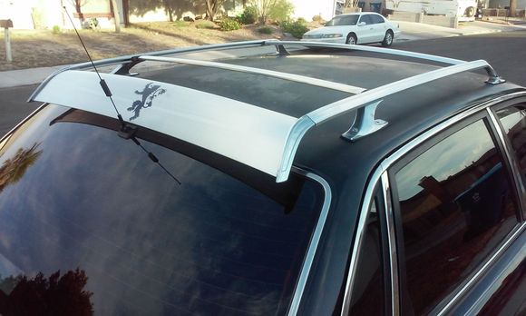 1986' caprice wagon estate roof rack fits like its stock looking...needs a cargo black cat rack on it or reese...for camping fishing and more service lights...lil game of throwns sticker...