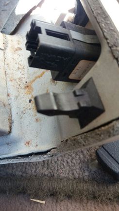 Gently pull out to release these, that is the valet button at top of photo. Other side same location.