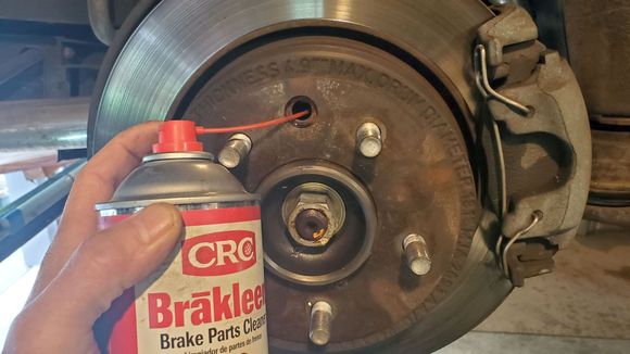Clean out the drum with a liberal spray
