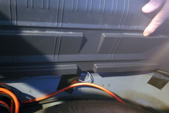 Why does Jag use the upper lip that prevents the floor from laying flat and making a big empty space between the spare and the floor?
