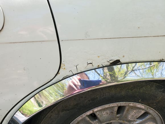 Rust on the rear quarter panel
