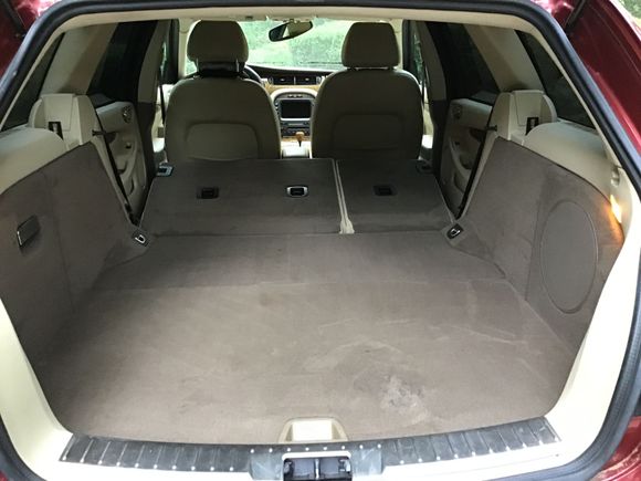 Back of car with seats down makes room for everything.