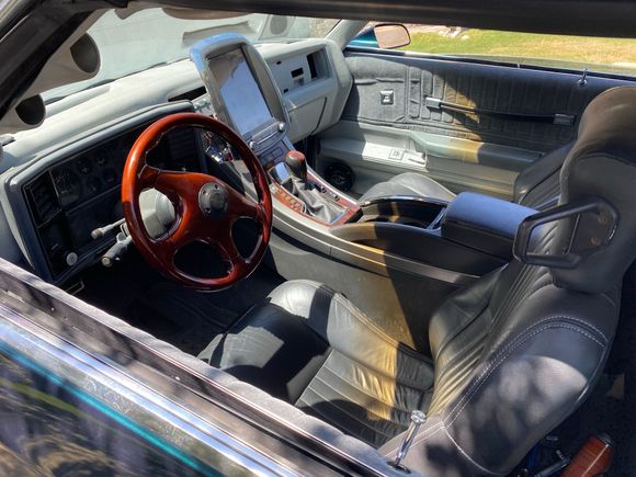 10.4 tesla panel and hi fi stereo with a 2012 La Crosse center console integrated floor shift 
Car is silly fast 