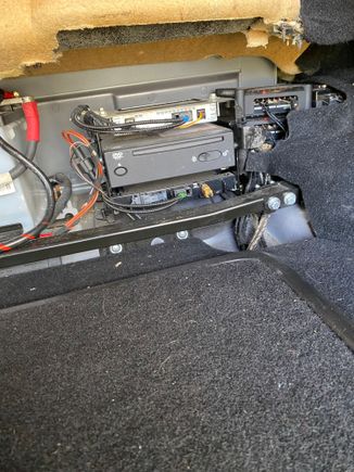 Rear with navigation dvd and subwoofer box in spare wheel well
