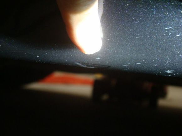 Arrow indent at sill edge, 7.25" rear of wheel well