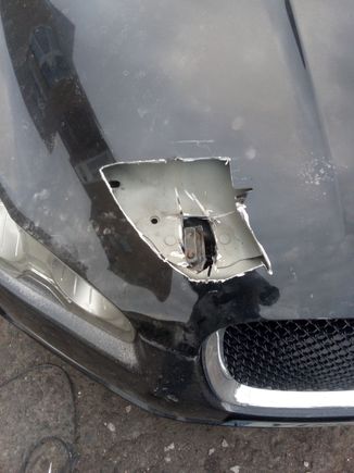 I needed to open up the hole in the outer skin to get my tool in to cut the latch free