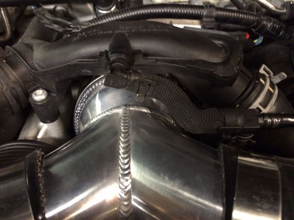 I cut off about 1/2" of excess silicone on the 3.75" to 3.5" reducer on the 3.5" end to clean up the fitting.