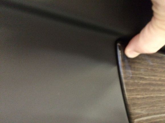 Rear driver trim pushed in. Goes about 3/8" into door card but takes a lot of force.