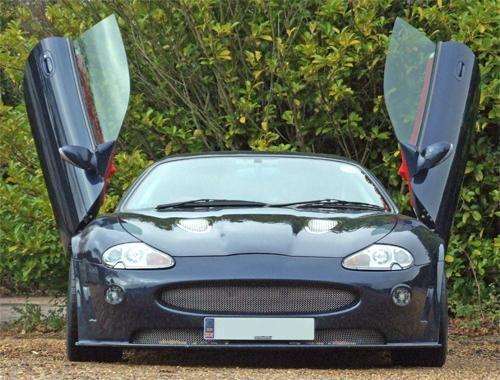 Lambo doors on an XK Coupe.
