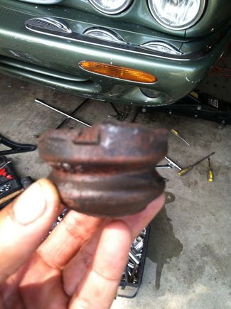 Deteriorated spring assister install atop front shock under gaiter/boot