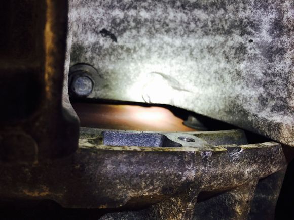 There's one of the bolts on the right, I couldn't get to them to check their torque.  It seems you must hand crank the engine.