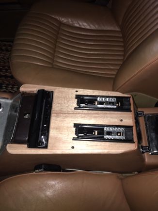 Slides for center console pop up stereo display.